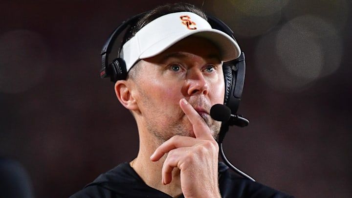 Nov 7, 2025; Los Angeles, California, USA; Southern California Trojans head coach Lincoln Riley watches game action against the Northwestern Wildcats during the second half at the Los Angeles Memorial Coliseum. Mandatory Credit: Gary A. Vasquez-Imagn Images