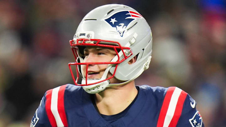 Jan 11, 2026; Foxborough, MA, USA; New England Patriots quarterback Drake Maye (10) smiles after a touchdown pass during the fourth quarter against the Los Angeles Chargers in an AFC Wild Card Round game at Gillette Stadium. Mandatory Credit: David Butler II-Imagn Images