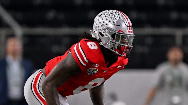 Dec 31, 2025; Arlington, TX, USA; Ohio State Buckeyes linebacker Arvell Reese (8) gets into position during the 2025 Cotton Bowl and quarterfinal game of the College Football Playoff at AT&T Stadium. Mandatory Credit: Jerome Miron-Imagn Images Dec 31, 2025; Arlington, TX, USA; Ohio State Buckeyes linebacker Arvell Reese (8) gets into position during the 2025 Cotton Bowl and quarterfinal game of the College Football Playoff at AT&T Stadium. Mandatory Credit: Jerome Miron-Imagn Images
