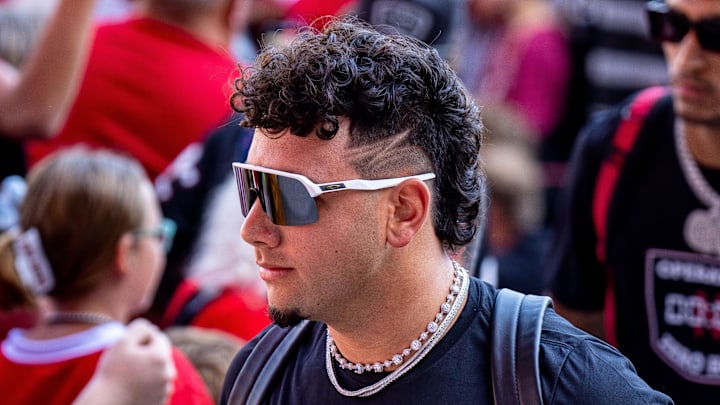 Sep 6, 2025; Lincoln, Nebraska, USA; Nebraska Cornhuskers quarterback Dylan Raiola (15) arrives with the team before a game against the Akron Zips at Memorial Stadium. Mandatory Credit: Dylan Widger-Imagn Images