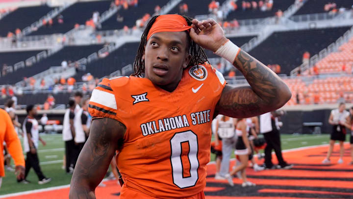 Oklahoma State Cowboys running back Ollie Gordon II (0) walks of the field after a college football game between the Oklahoma State Cowboys (OSU) and the West Virginia Mountaineers at Boone Pickens Stadium in Stillwater, Okla., Saturday, Oct. 5, 2024.