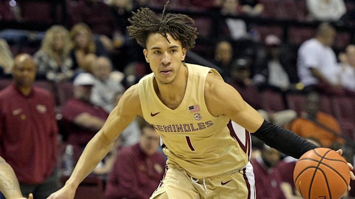 Feb 20, 2024; Tallahassee, Florida, USA; Florida State Seminoles guard Jalen Warley (1) moves the ball up the court against the Boston College Eagles in the first half at Donald L. Tucker Center. Mandatory Credit: Melina Myers-Imagn Images