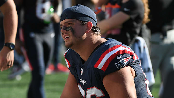 Sep 28, 2025; Foxborough, Massachusetts, USA; New England Patriots offensive tackle Will Campbell (66) talks to a teammate during the second half against the Carolina Panthers at Gillette Stadium. Mandatory Credit: Bob DeChiara-Imagn Images