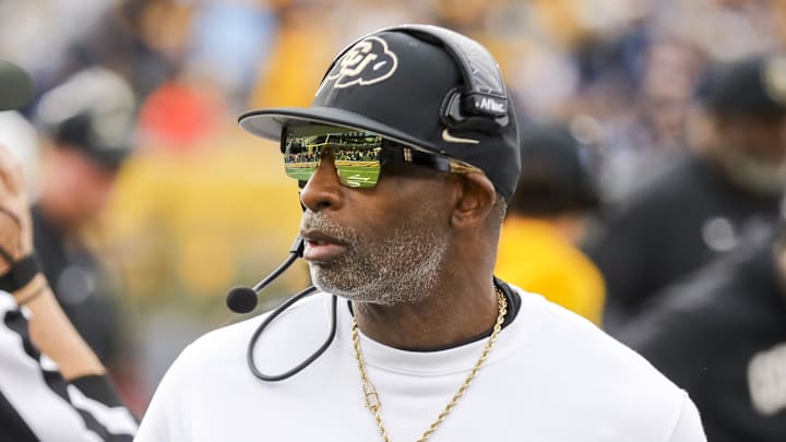 Nov 8, 2025; Morgantown, West Virginia, USA; Colorado Buffaloes head coach Deion Sanders walks along the sidelines late in the fourth quarter against the West Virginia Mountaineers at Milan Puskar Stadium. Mandatory Credit: Ben Queen-Imagn Images
