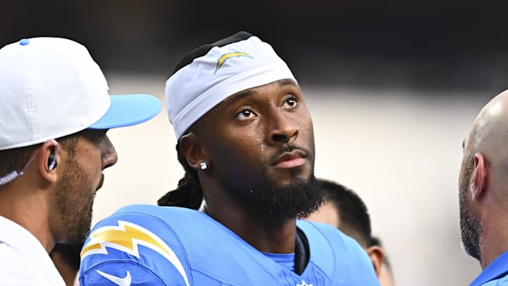 Aug 16, 2025; Inglewood, California, USA; Los Angeles Chargers wide receiver Quentin Johnston (1) reacts after standing up from an injury against the Los Angeles Rams during the first quarter at SoFi Stadium. Mandatory Credit: Jonathan Hui-Imagn Images