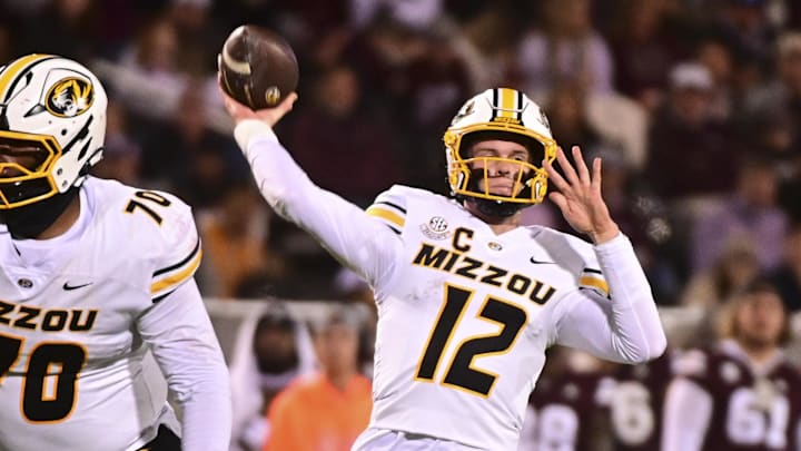 Missouri Tigers quarterback Brady Cook (12) throws against the Mississippi State Bulldogs during the third quarter at Davis Wade Stadium at Scott Field in Starkville, ,Miss., last Saturday. 