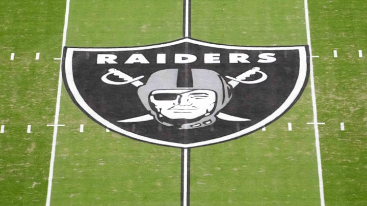Jan 4, 2026; Paradise, Nevada, USA; The Las Vegas Raiders shield logo at midfield at Allegiant Stadium. Mandatory Credit: Kirby Lee-Imagn Images Jan 4, 2026; Paradise, Nevada, USA; The Las Vegas Raiders shield logo at midfield at Allegiant Stadium. Mandatory Credit: Kirby Lee-Imagn Images