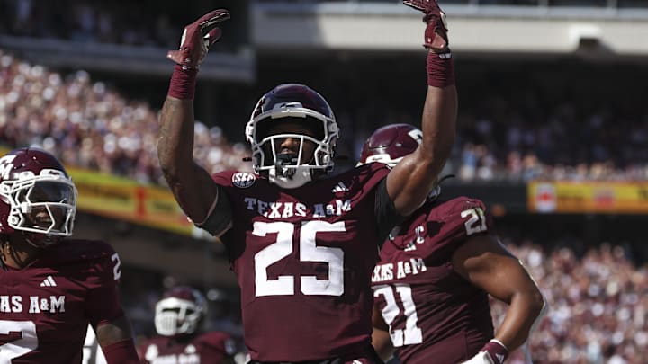 Nov 15, 2025; College Station, Texas, USA; Texas A&M Aggies safety Dalton Brooks (25) reacts after an interception during the second quarter against the South Carolina Gamecocks at Kyle Field.
