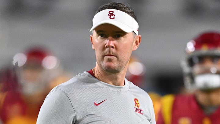 Oct 1, 2022; Los Angeles, California, USA; USC Trojans head coach Lincoln Riley walks on the field before a game against the Arizona State Sun Devils at United Airlines Field at the Los Angeles Memorial Coliseum. Mandatory Credit: Jayne Kamin-Oncea-Imagn Images Oct 1, 2022; Los Angeles, California, USA; USC Trojans head coach Lincoln Riley walks on the field before a game against the Arizona State Sun Devils at United Airlines Field at the Los Angeles Memorial Coliseum. Mandatory Credit: Jayne Kamin-Oncea-Imagn Images