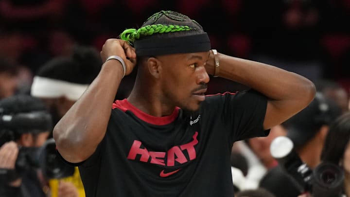 Jan 2, 2025; Miami, Florida, USA;  Miami Heat forward Jimmy Butler (22) gets ready for pregame warm-ups before the start of the game against the Indiana Pacers at Kaseya Center. Mandatory Credit: Jim Rassol-Imagn Images
