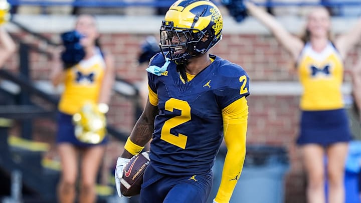 Michigan defensive back Will Johnson celebrates a touchdown after intercepting USC quarterback Miller Moss during the second half at Michigan Stadium in Ann Arbor on Saturday, Sept. 21, 2024. Michigan defensive back Will Johnson celebrates a touchdown after intercepting USC quarterback Miller Moss during the second half at Michigan Stadium in Ann Arbor on Saturday, Sept. 21, 2024.