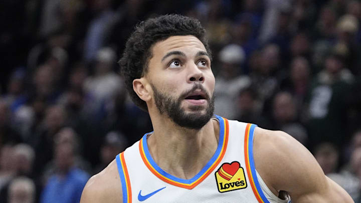 Jan 21, 2026; Milwaukee, Wisconsin, USA; Oklahoma City Thunder guard Ajay Mitchell (25) goest up for shot after stealing the ball from he Milwaukee Bucks at Fiserv Forum. Mandatory Credit: Michael McLoone-Imagn Images