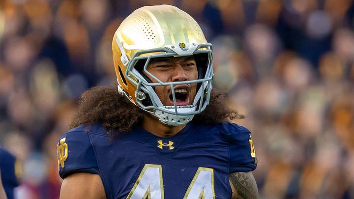 Notre Dame Fighting Irish defensive lineman Junior Tuihalamaka (44) celebrates a stop against the Syracuse Orange Notre Dame Fighting Irish defensive lineman Junior Tuihalamaka (44) celebrates a stop against the Syracuse Orange