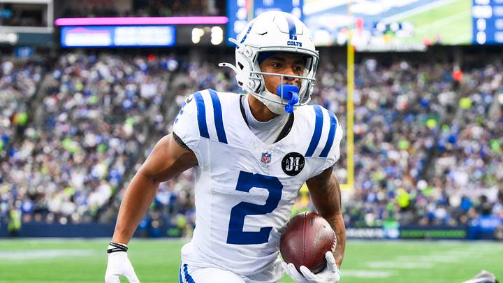 Dec 14, 2025; Seattle, Washington, USA; Indianapolis Colts wide receiver Josh Downs (2) runs into the end zone for a touchdown after catching a pass against the Seattle Seahawks during the second quarter at Lumen Field. Mandatory Credit: Steven Bisig-Imagn Images