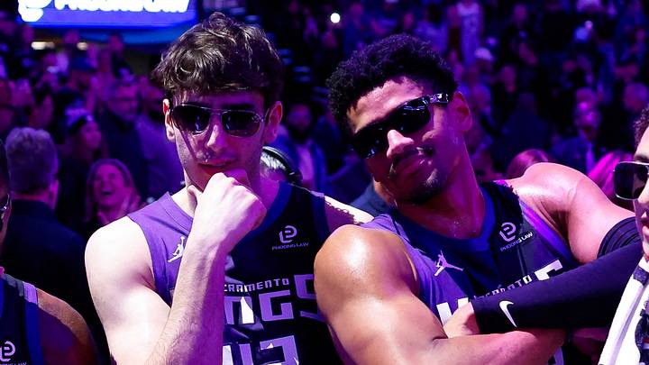 Jan 16, 2026; Sacramento, California, USA; Sacramento Kings forward Precious Achiuwa (9) and center Maxime Raynaud (42) and center Dylan Cardwell (32) and guard Nique Clifford (5) celebrate after lighting the beam in celebration of their victory against the Washington Wizards at Golden 1 Center. Mandatory Credit: Sergio Estrada-Imagn Images