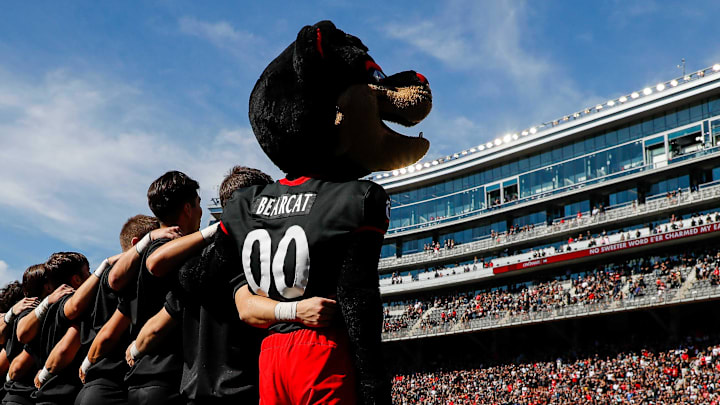 Sep 23, 2023; Cincinnati, Ohio, USA; The Cincinnati Bearcats mascot stands on the field during the playing of the Alma Mater prior to the game against the Oklahoma Sooners at Nippert Stadium. Mandatory Credit: Katie Stratman-Imagn Images Sep 23, 2023; Cincinnati, Ohio, USA; The Cincinnati Bearcats mascot stands on the field during the playing of the Alma Mater prior to the game against the Oklahoma Sooners at Nippert Stadium. Mandatory Credit: Katie Stratman-Imagn Images