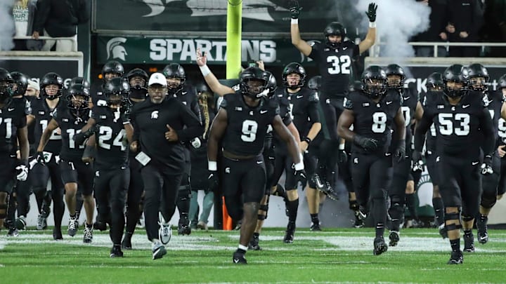 Michigan State Spartans interim head coach Harlon Barnett takes the field with his team before action against the Michigan Wolverines at Spartan Stadium in East Lansing on Saturday, Oct. 21, 2023.