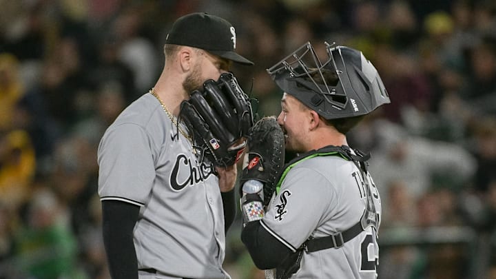 Chicago White Sox pitcher Sean Burke (59) speaks with catcher Matt Thaiss (29) against the Athletics at Sutter Health Park. Chicago White Sox pitcher Sean Burke (59) speaks with catcher Matt Thaiss (29) against the Athletics at Sutter Health Park.