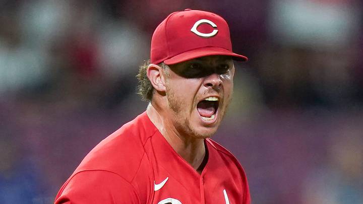 Cincinnati Reds pitcher Emilio Pagán (15) celebrates