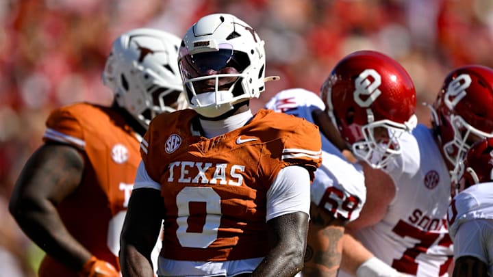 Texas Longhorns linebacker Anthony Hill Jr. (0) celebrates after a defensive stop against the Oklahoma Sooners during the first half at the Cotton Bowl. Texas Longhorns linebacker Anthony Hill Jr. (0) celebrates after a defensive stop against the Oklahoma Sooners during the first half at the Cotton Bowl.