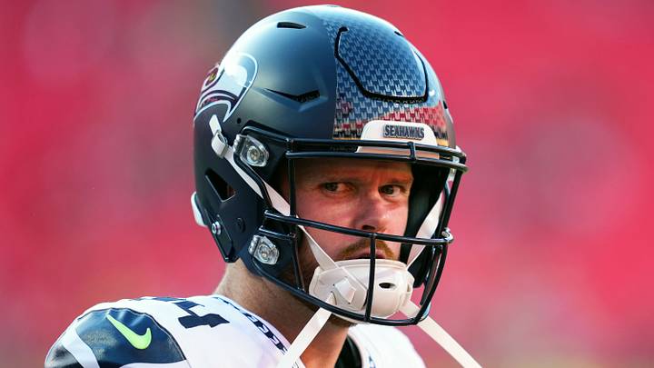 Aug 28, 2026; Kansas City, Missouri, USA; Seattle Seahawks quarterback Sam Darnold (14) takes the field prior to a game against the Kansas City Chiefs at Arrowhead Stadium. Mandatory Credit: Jay Biggerstaff-Imagn Images