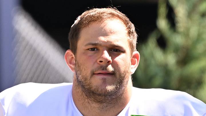New England Patriots center Garrett Bradbury (65) heads to the practice field