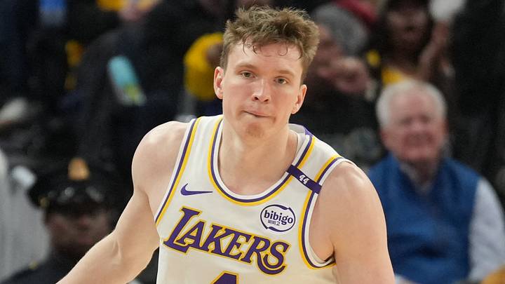 Jan 25, 2025; San Francisco, California, USA; Los Angeles Lakers guard Dalton Knecht (4) gestures after making a three point basket against the Golden State Warriors during the third quarter at Chase Center. Mandatory Credit: Darren Yamashita-Imagn Images