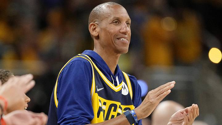 Jun 13, 2025; Indianapolis, Indiana, USA; Reggie Miller applauds during the second half during game four of the 2025 NBA Finals at Gainbridge Fieldhouse. Mandatory Credit: Kyle Terada-Imagn Images