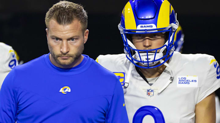 Dec 13, 2021; Glendale, Arizona, USA; Los Angeles Rams head coach Sean McVay with defensive tackle Aaron Donald (99) and quarterback Matthew Stafford (9) against the Arizona Cardinals at State Farm Stadium. Mandatory Credit: Mark J. Rebilas-Imagn Images Dec 13, 2021; Glendale, Arizona, USA; Los Angeles Rams head coach Sean McVay with defensive tackle Aaron Donald (99) and quarterback Matthew Stafford (9) against the Arizona Cardinals at State Farm Stadium. Mandatory Credit: Mark J. Rebilas-Imagn Images