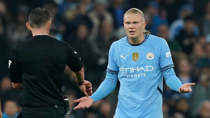 Erling Haaland (right) threw a ball at Gabriel's head when Manchester City hosted Arsenal.