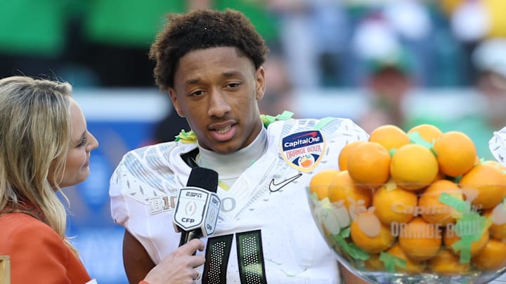 Jan 1, 2026; Miami Gardens, FL, USA; Oregon Ducks defensive back Brandon Finney (4) is interviewed by. ESPN’s Katie George following the 2025 Orange Bowl and quarterfinal game of the College Football Playoff against the Texas Tech Red Raiders at Hard Rock Stadium. Mandatory Credit: Nathan Ray Seebeck-Imagn Images