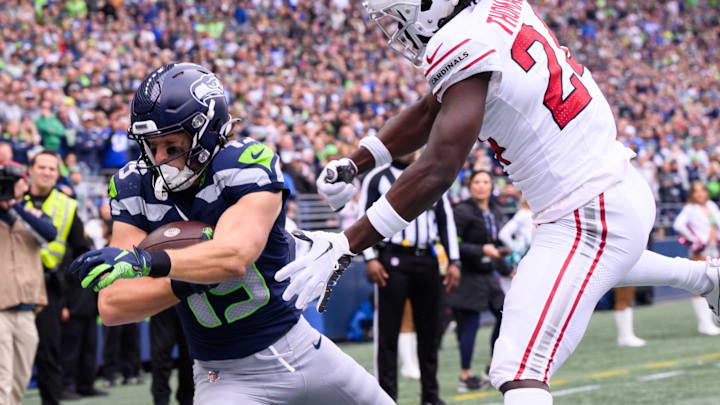 Oct 22, 2023; Seattle, Washington, USA; Seattle Seahawks wide receiver Jake Bobo (19) catches a pass for a touchdown over Arizona Cardinals cornerback Starling Thomas V (24) during the first half at Lumen Field. Oct 22, 2023; Seattle, Washington, USA; Seattle Seahawks wide receiver Jake Bobo (19) catches a pass for a touchdown over Arizona Cardinals cornerback Starling Thomas V (24) during the first half at Lumen Field.
