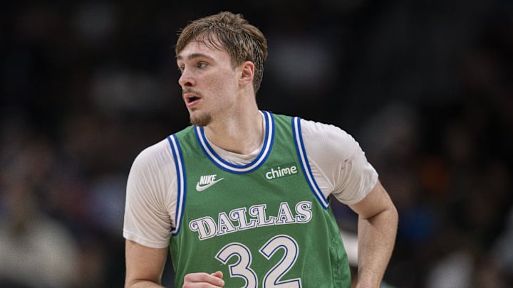 Apr 3, 2026; Dallas, Texas, USA; Dallas Mavericks forward Cooper Flagg (32) runs back up the court during the game between the Mavericks and the Magic at American Airlines Center. Mandatory Credit: Jerome Miron-Imagn Images