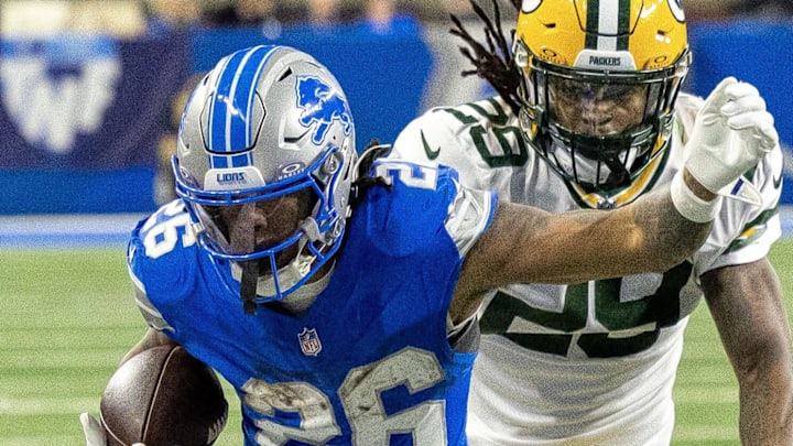 Detroit Lions running back Jahmyr Gibbs (26) runs with the ball against the Packers last season.