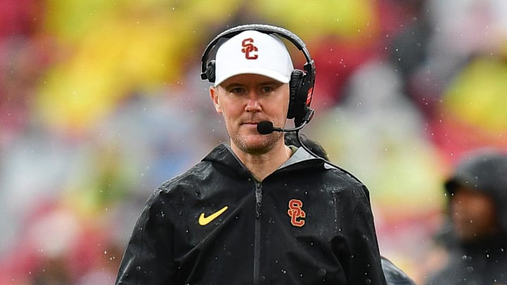 Nov 15, 2025; Los Angeles, California, USA; Southern California Trojans head coach Lincoln Riley watches game action against the Iowa Hawkeyes during the first half at the Los Angeles Memorial Coliseum. Mandatory Credit: Gary A. Vasquez-Imagn Images
