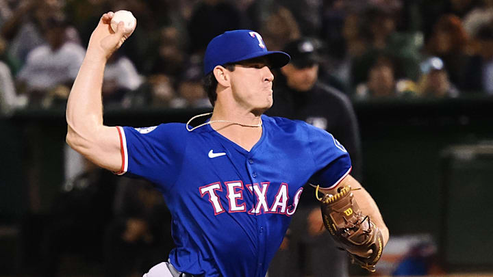 Sep 25, 2024; Oakland, California, USA; Texas Rangers relief pitcher Matt Festa (63) pitches the ball against the Oakland Athletics during the fifth inning at Oakland-Alameda County Coliseum.