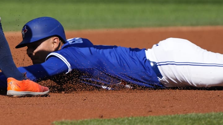 Andres Gimenez steals. 