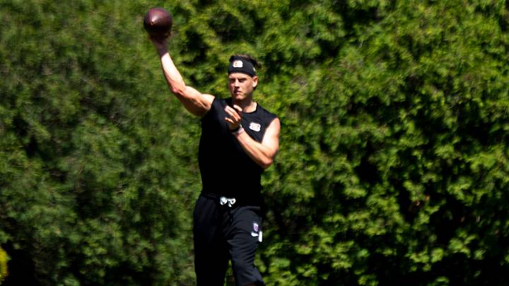 Cincinnati Bengals quarterback Joe Burrow (9) throws a pass during a practice session at the Kettering Health Practice Fields in Cincinnati on Tuesday, May 12, 2026.