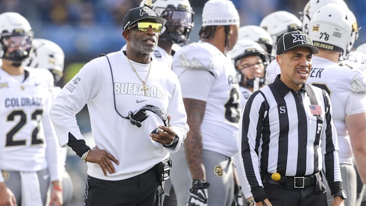 Nov 8, 2025; Morgantown, West Virginia, USA; Colorado Buffaloes head coach Deion Sanders watches the big screen during a replay during the first quarter against the West Virginia Mountaineers at Milan Puskar Stadium. Mandatory Credit: Ben Queen-Imagn Images Nov 8, 2025; Morgantown, West Virginia, USA; Colorado Buffaloes head coach Deion Sanders watches the big screen during a replay during the first quarter against the West Virginia Mountaineers at Milan Puskar Stadium. Mandatory Credit: Ben Queen-Imagn Images