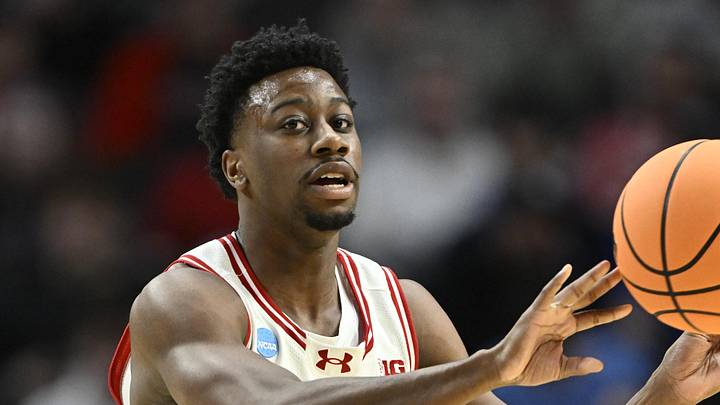 Mar 19, 2026; Portland, OR, USA; Wisconsin Badgers guard John Blackwell (25) passes against the High Point Panthers during the first half of a first round game of the men's 2026 NCAA Tournament at Moda Center. Mandatory Credit: Craig Strobeck-Imagn Images