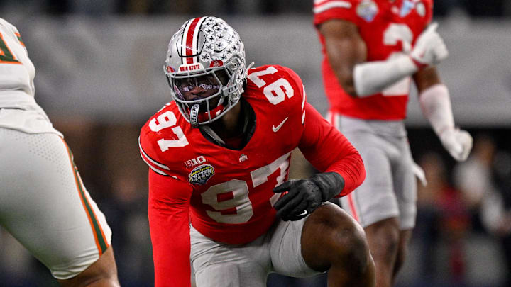 Dec 31, 2025; Arlington, TX, USA; Ohio State Buckeyes defensive end Kenyatta Jackson Jr. (97) gets into position during the 2025 Cotton Bowl and quarterfinal game of the College Football Playoff at AT&T Stadium. Mandatory Credit: Jerome Miron-Imagn Images