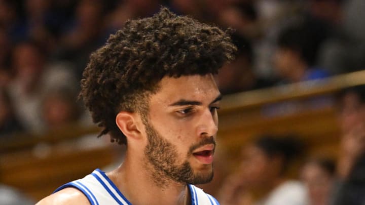 Feb 16, 2026; Durham, North Carolina, USA; Duke Blue Devils forward Cameron Boozer (12) interacts with his teammates during the during the first half against the Syracuse Orange at Cameron Indoor Stadium. Mandatory Credit: Zachary Taft-Imagn Images Feb 16, 2026; Durham, North Carolina, USA; Duke Blue Devils forward Cameron Boozer (12) interacts with his teammates during the during the first half against the Syracuse Orange at Cameron Indoor Stadium. Mandatory Credit: Zachary Taft-Imagn Images