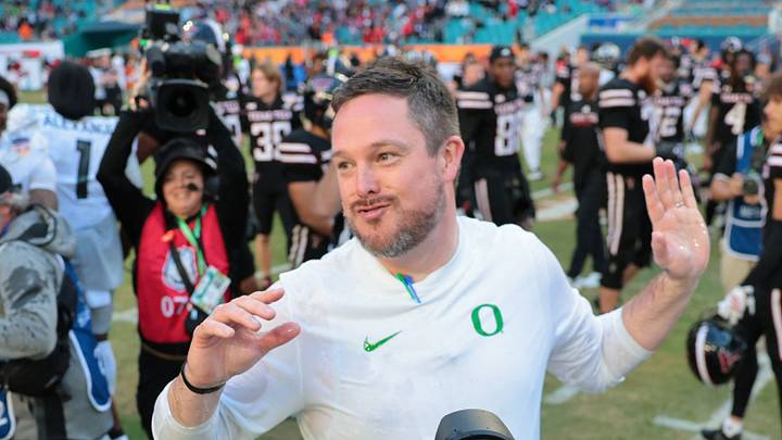 Jan 1, 2026; Miami Gardens, FL, USA; Oregon Ducks head coach Dan Lanning reacts after getting a gatorade bath from his players following the 2025 Orange Bowl and quarterfinal game of the College Football Playoff against the Texas Tech Red Raiders at Hard Rock Stadium. Jan 1, 2026; Miami Gardens, FL, USA; Oregon Ducks head coach Dan Lanning reacts after getting a gatorade bath from his players following the 2025 Orange Bowl and quarterfinal game of the College Football Playoff against the Texas Tech Red Raiders at Hard Rock Stadium.