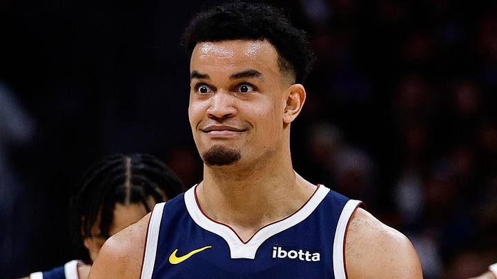Jan 20, 2026; Denver, Colorado, USA; Denver Nuggets forward Spencer Jones (21) reacts after a play in the third quarter against the Los Angeles Lakers at Ball Arena. Mandatory Credit: Isaiah J. Downing-Imagn Images