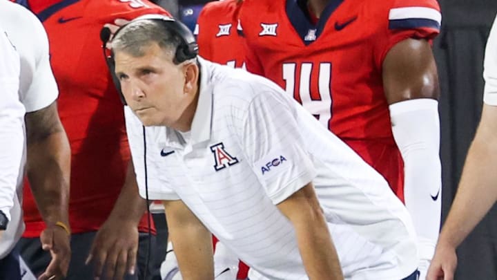 Sep 6, 2025; Tucson, Arizona, USA; Arizona Wildcats head coach Brent Brennan watches from the sidelines during the first quarter of the game against the Weber State Wildcats at Arizona Stadium. Mandatory Credit: Aryanna Frank-Imagn Images