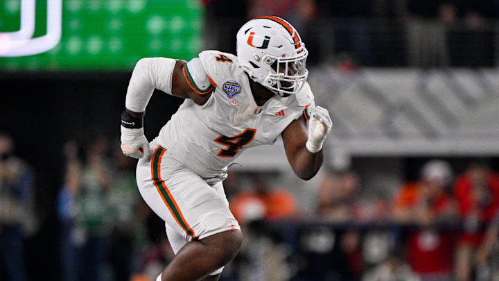 Dec 31, 2025; Arlington, TX, USA; Miami Hurricanes defensive lineman Rueben Bain Jr. (4) rushes the line during the 2025 Cotton Bowl and quarterfinal game of the College Football Playoff at AT&T Stadium. Mandatory Credit: Jerome Miron-Imagn Images