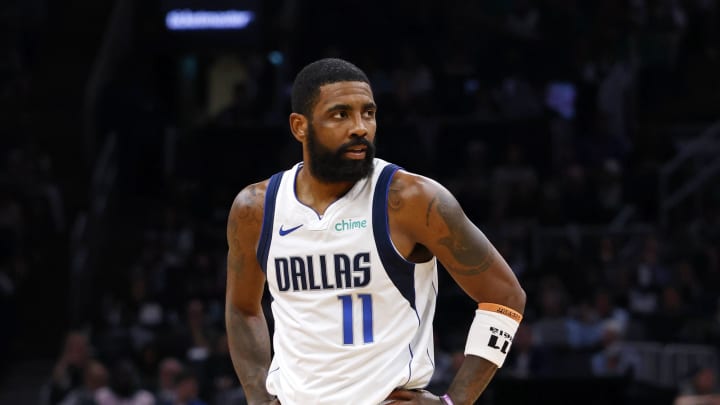 Jun 9, 2024; Boston, Massachusetts, USA; Dallas Mavericks guard Kyrie Irving (11) reacts after a play against the Boston Celtics during the first quarter in game two of the 2024 NBA Finals at TD Garden. Mandatory Credit: Peter Casey-USA TODAY Sports Jun 9, 2024; Boston, Massachusetts, USA; Dallas Mavericks guard Kyrie Irving (11) reacts after a play against the Boston Celtics during the first quarter in game two of the 2024 NBA Finals at TD Garden. Mandatory Credit: Peter Casey-USA TODAY Sports