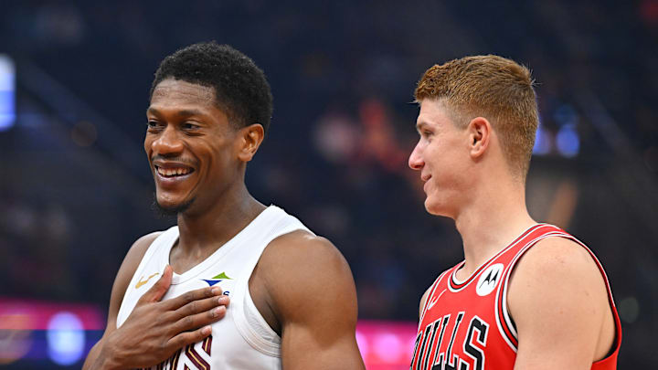 Kevin Huerter and De'Andre Hunter chat during a match between the Cavaliers and Bulls