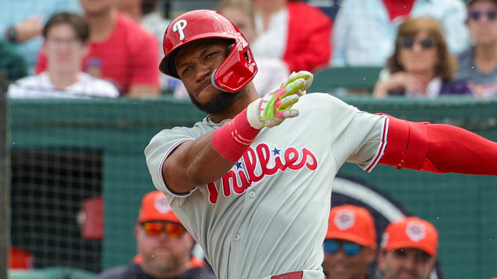 Feb 22, 2025; Lakeland, Florida, USA; Philadelphia Phillies outfielder Johan Rojas (18) bats during the third inning against the Detroit Tigers at Publix Field at Joker Marchant Stadium