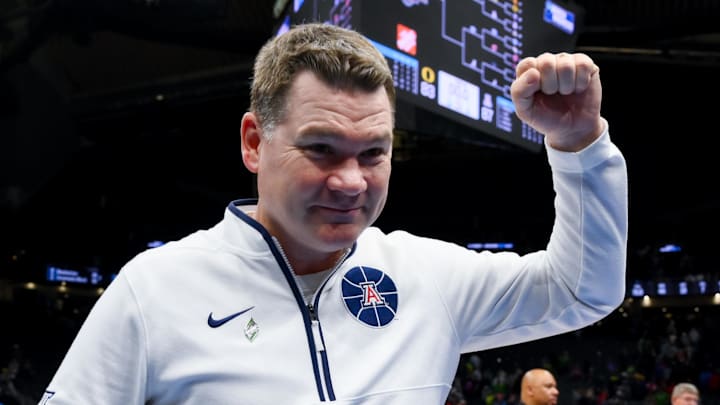 Mar 23, 2025; Seattle, WA, USA; Arizona Wildcats head coach Tommy Lloyd celebrates after defeating the Oregon Ducks at Climate Pledge Arena. Mandatory Credit: Stephen Brashear-Imagn Images Mar 23, 2025; Seattle, WA, USA; Arizona Wildcats head coach Tommy Lloyd celebrates after defeating the Oregon Ducks at Climate Pledge Arena. Mandatory Credit: Stephen Brashear-Imagn Images